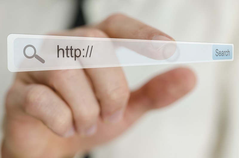 https:// url in browser tab held in hand